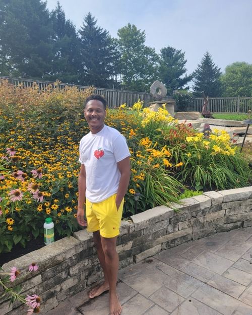 Educator wearing LEAD with Heart shirt