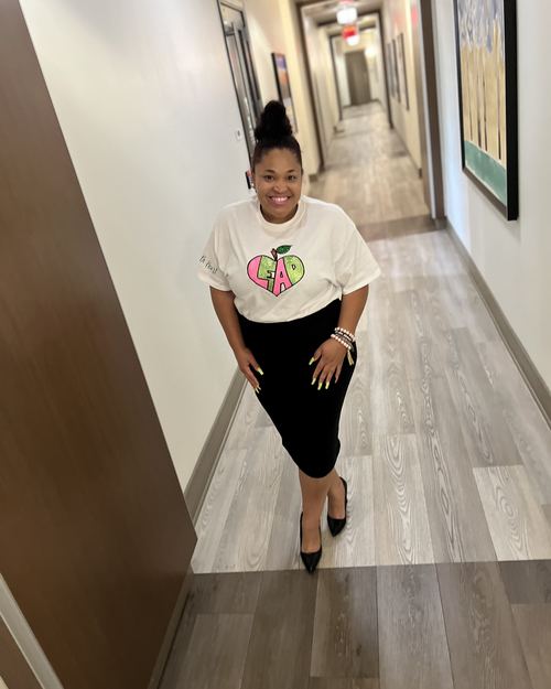 Educator wearing LEAD with Heart shirt