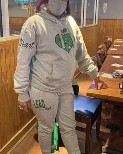 Educator wearing LEAD with Heart shirt