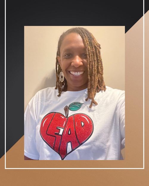 Educator wearing LEAD with Heart shirt