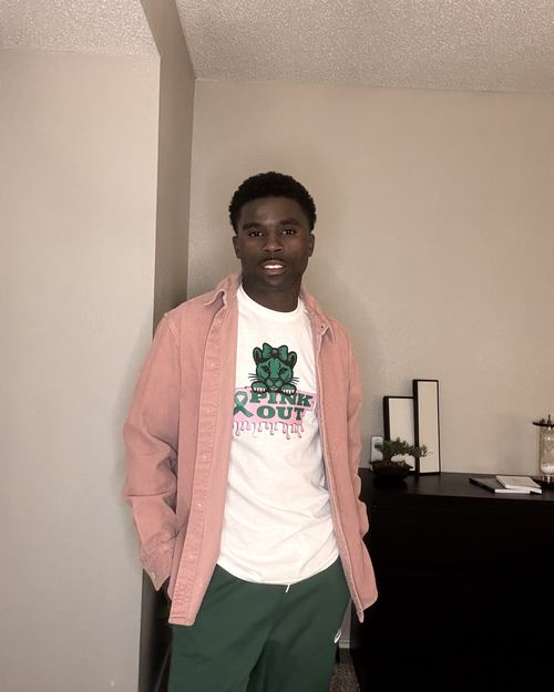 Educator wearing LEAD with Heart shirt