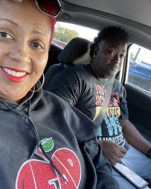 Educator wearing LEAD with Heart shirt